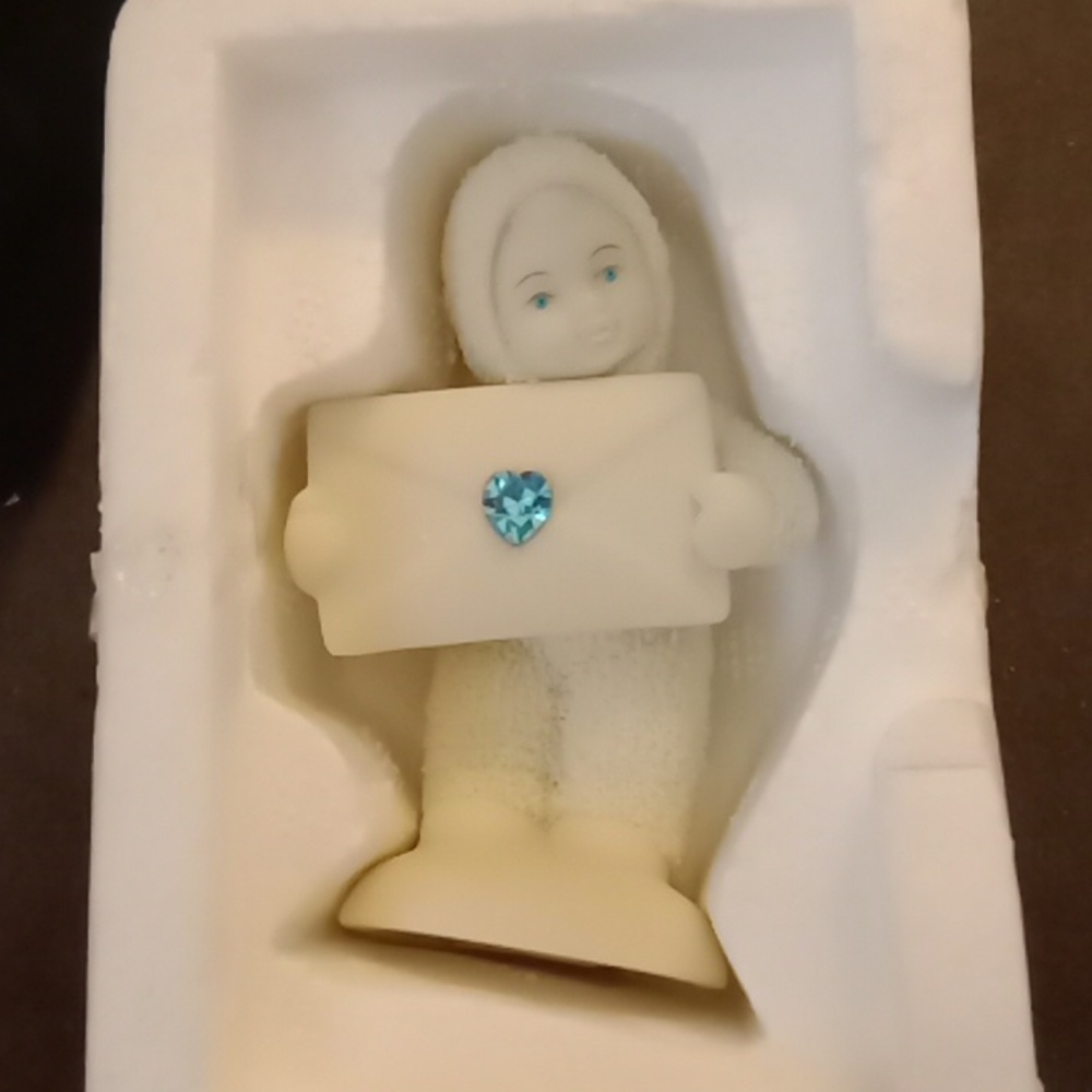 Snowbabies " extra special delivery" 200 featuring a heart shaped birthstone